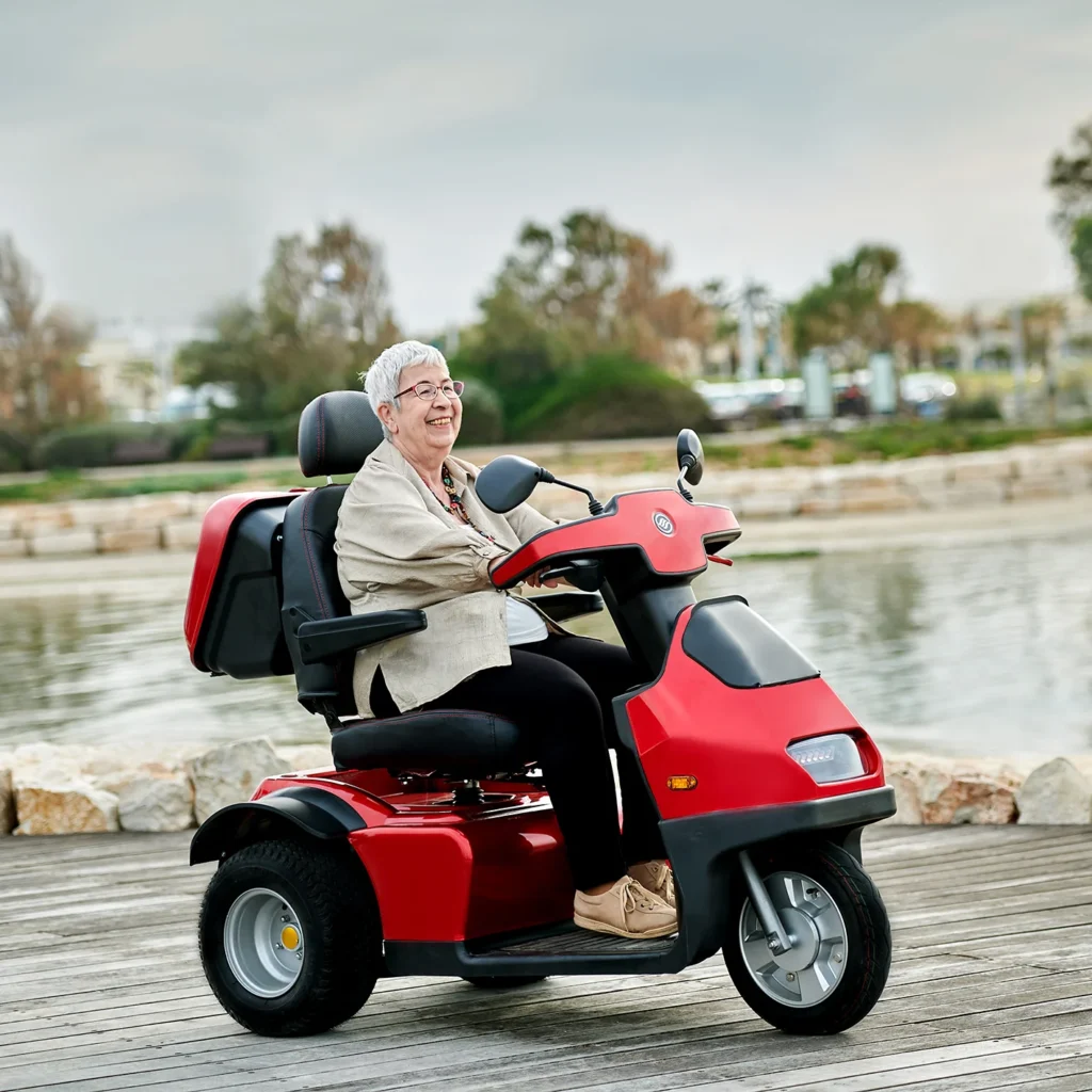 Red Afiscooter S3 Off-road in the lake side lifestyle image