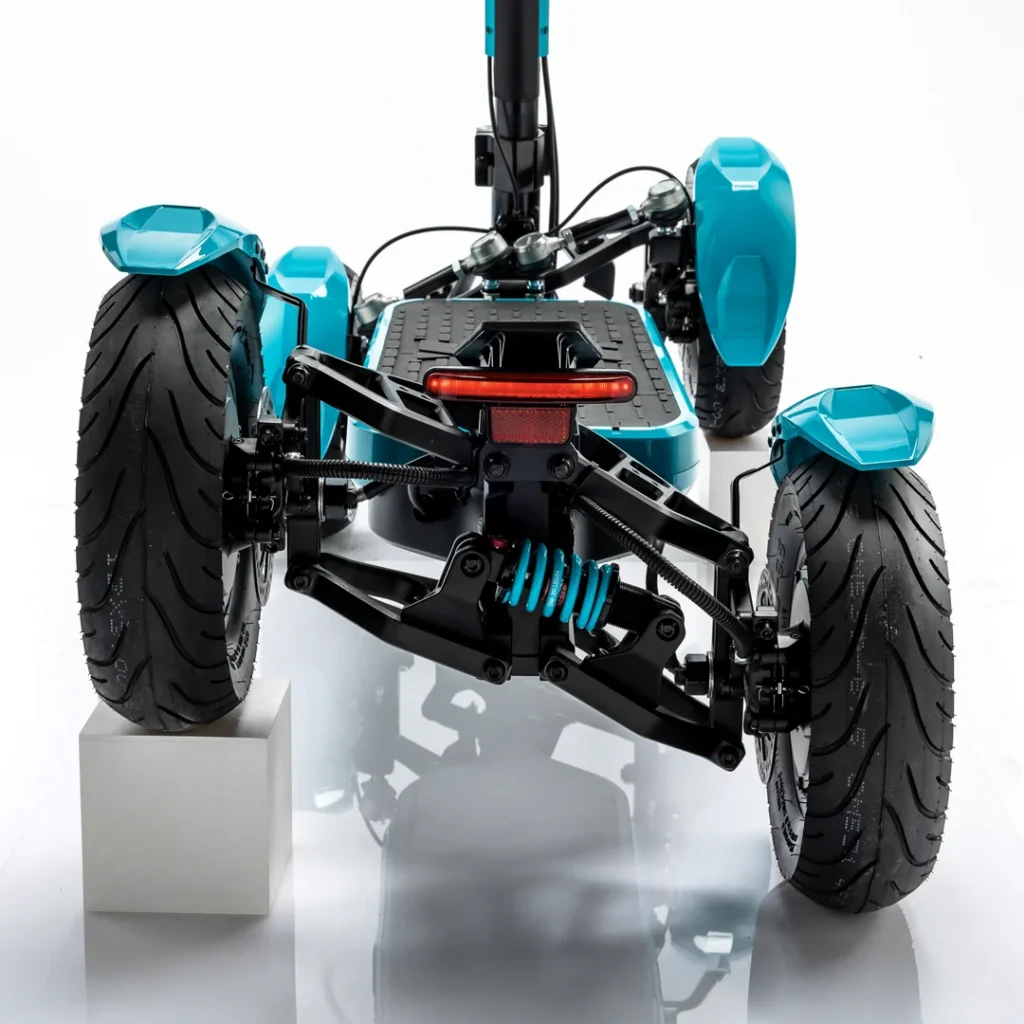 ear view of MIA SPYQE GT electric scooter showing suspension system brake light and wide tires